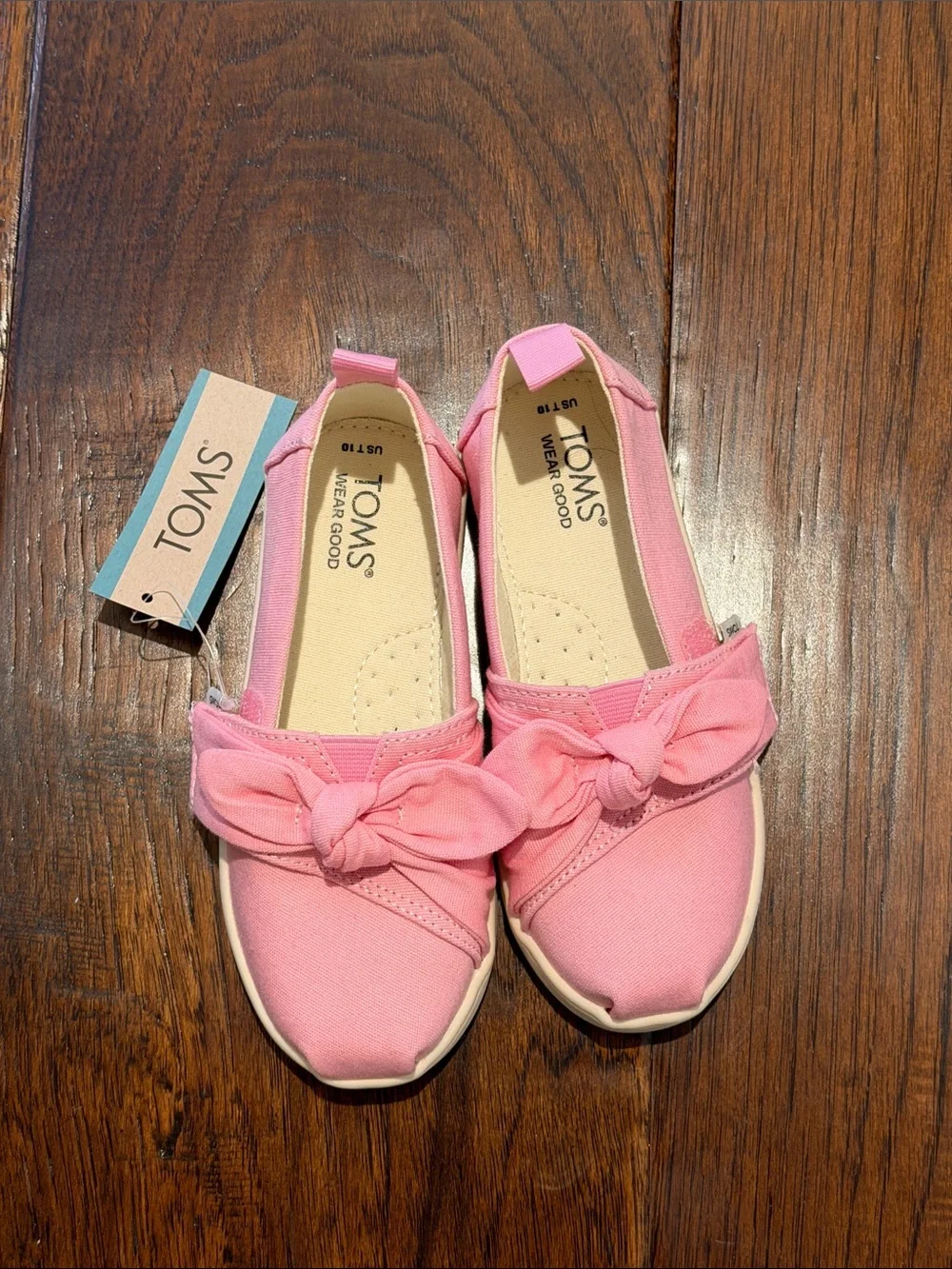 TOMS Kids Pink Canvas Slip-On Moccasins with Bow Detail